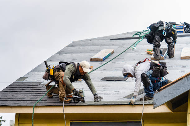 Professional Roofing technician working in Redgranite, WI
